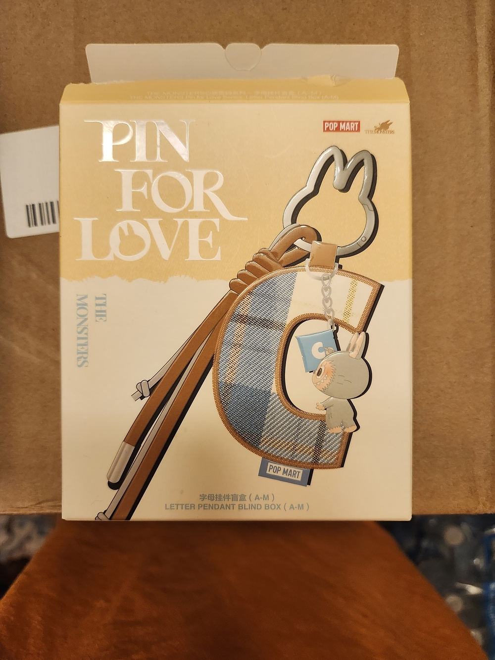 POP MART Monsters — Mystery Letter Pendant (F) • Fierce, Fun, and Collectible